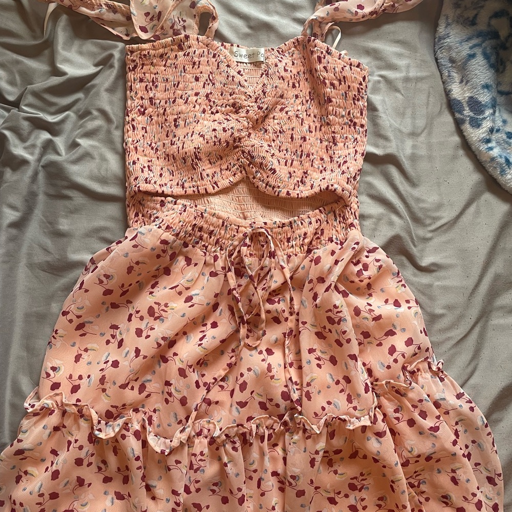 Boutique floral dress with cutout